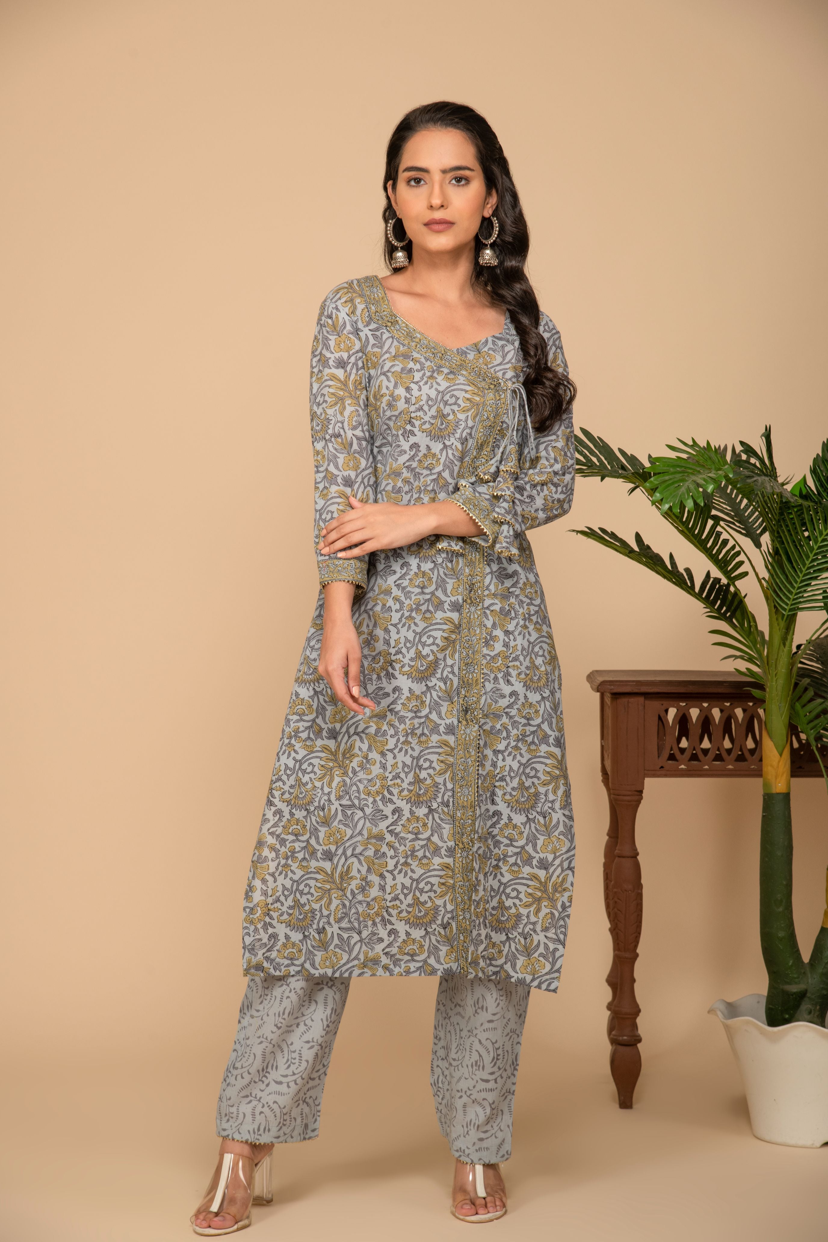 Grey printed kurta with grey printed bottom 3 piece suit set with buttis allover dupatta.