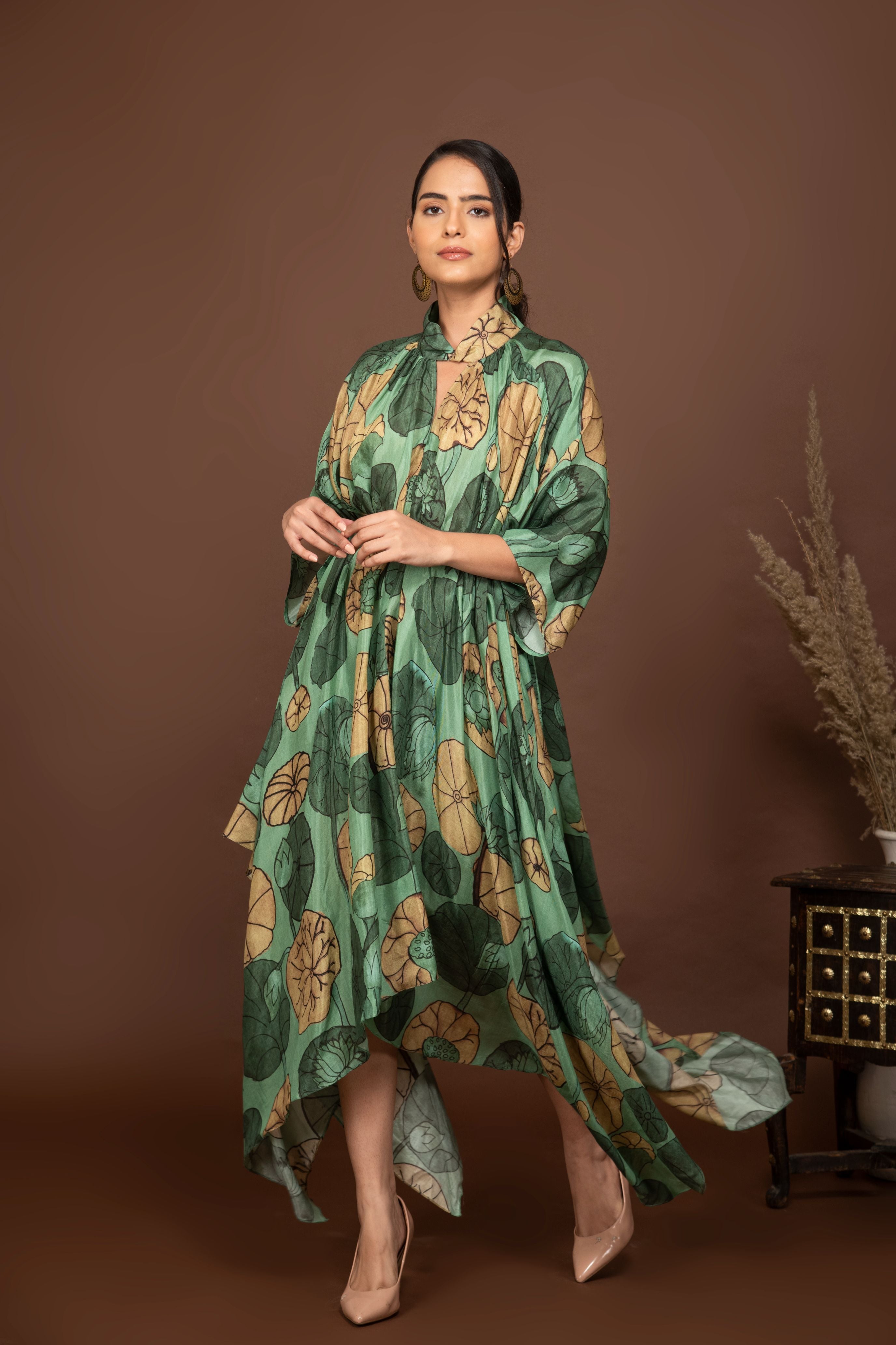 Teal green soft muslin bold prints high-low dress with tie up belt.