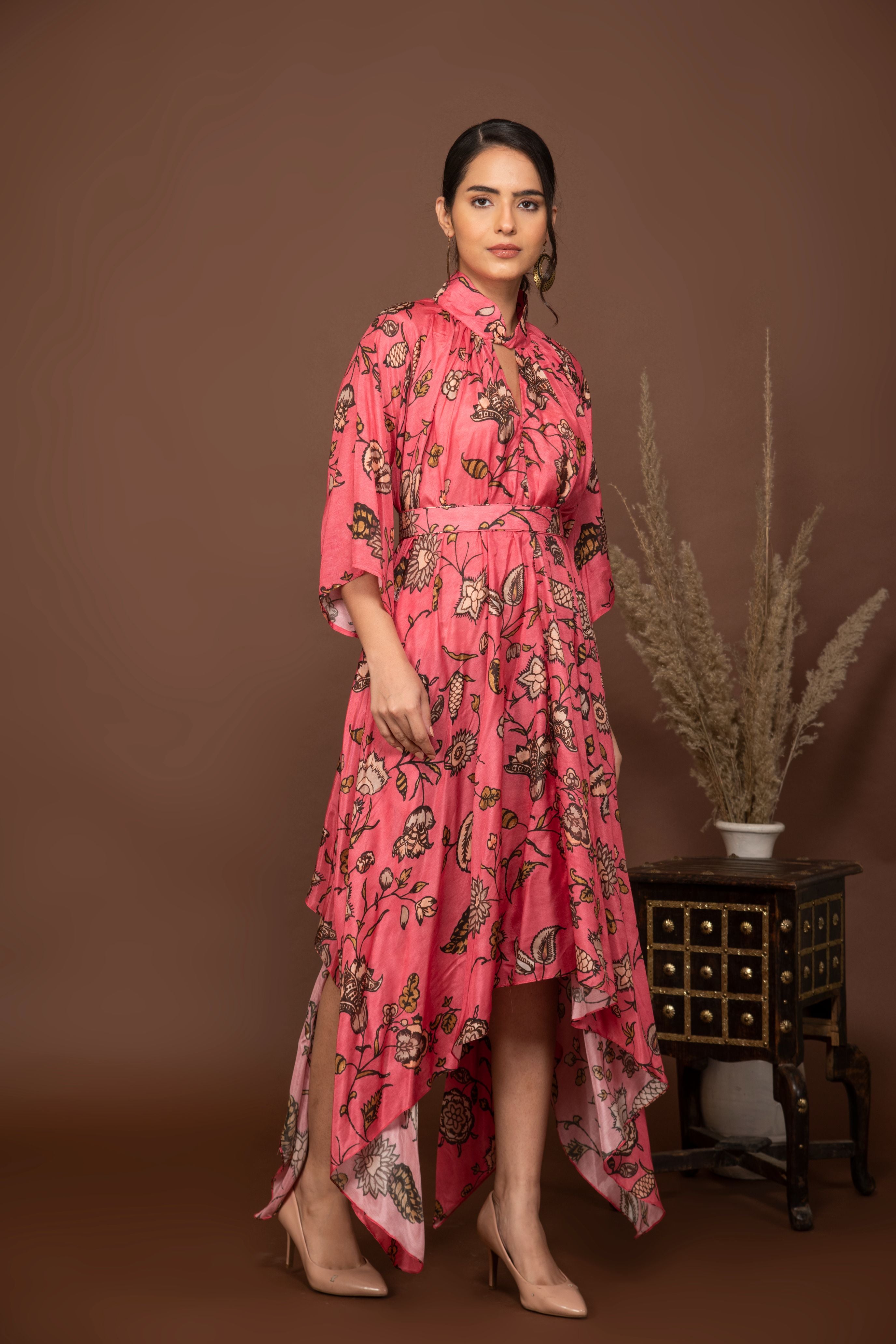 Pink soft muslin bold prints high-low dress with tie up belt.