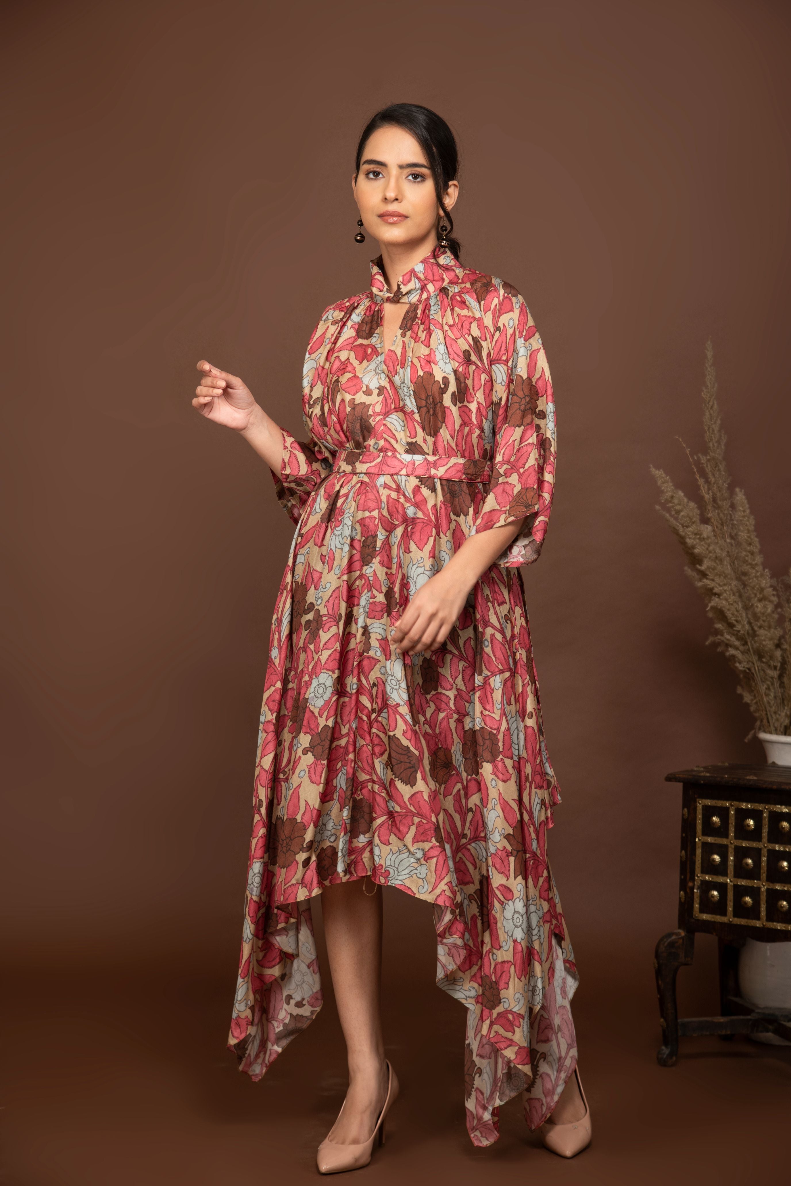 Brown soft muslin bold prints high-low dress with tie up belt.