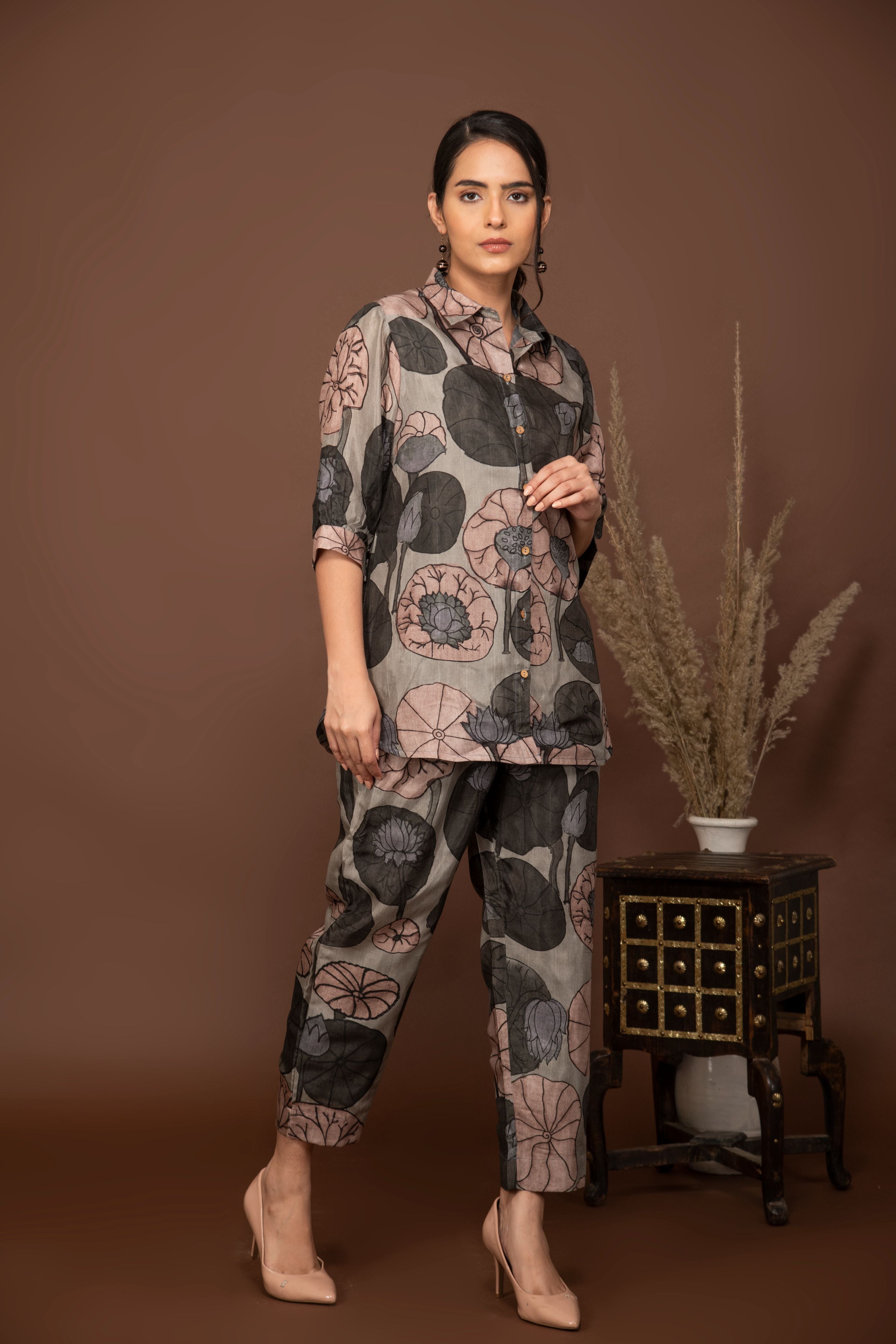 Grey soft muslin with bold floral printed top and bottom all over.
