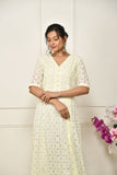 Lemon yellow georgette thread embroidered flared top with a front slit and a yoke lining