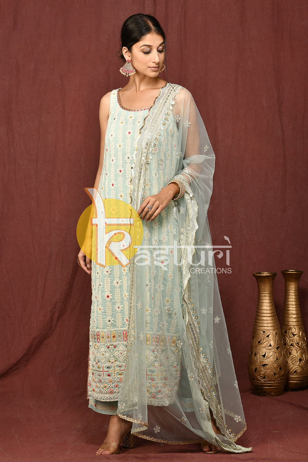 Sky blue embroidered with mirror work georgette kurta and pant set